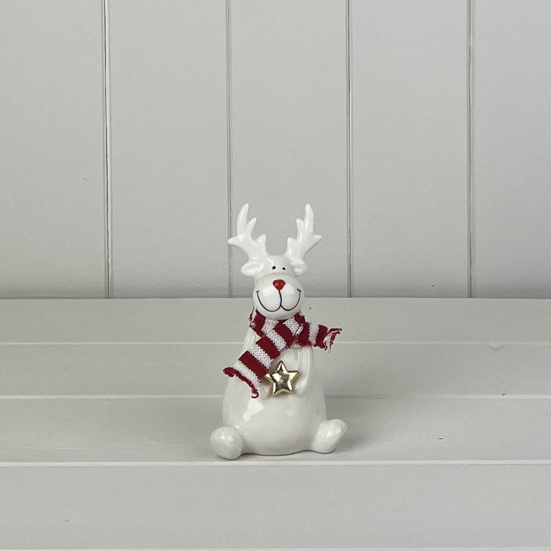 Small White Sitting Ceramic Reindeer Ornament with Knitted Scarf and Star detail page
